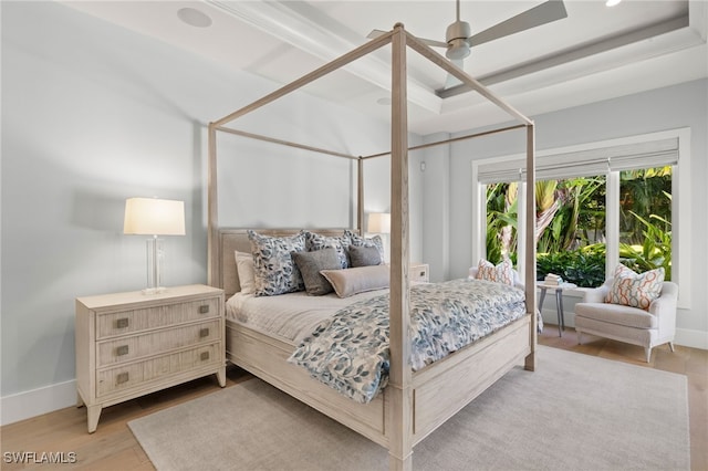 bedroom with wood finished floors, baseboards, ceiling fan, and access to outside