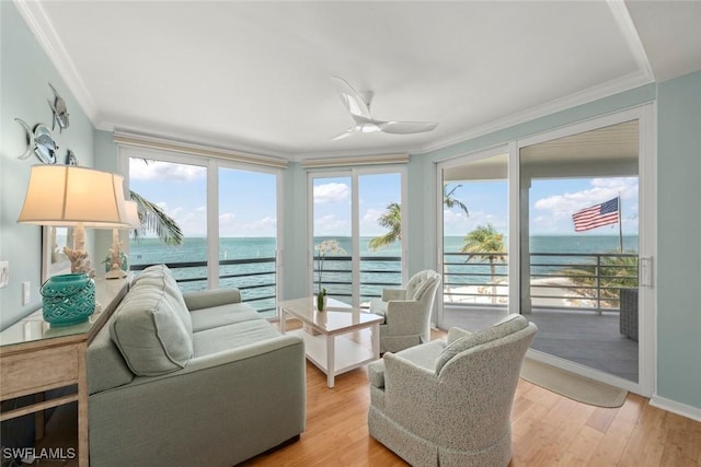 sunroom with a water view