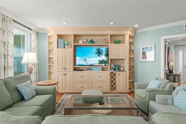 living room with crown molding, light wood finished floors, and recessed lighting