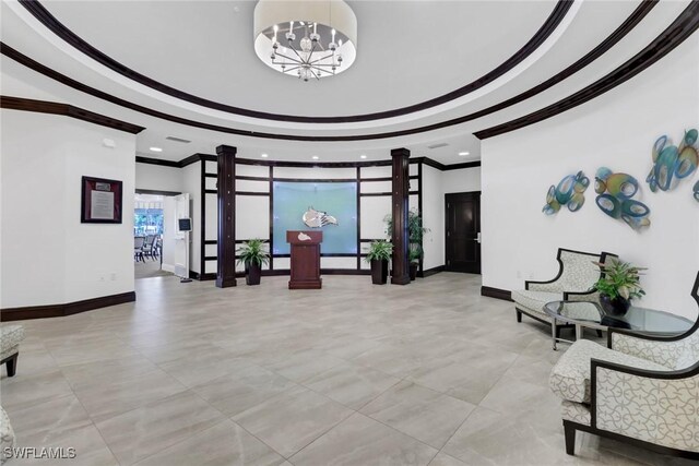 lobby featuring ornamental molding and recessed lighting