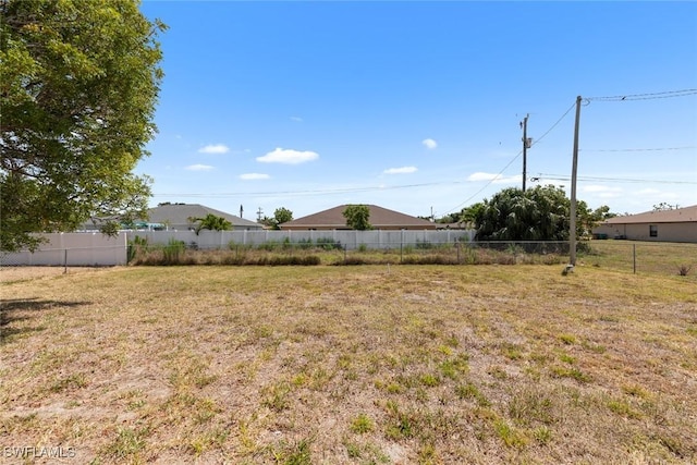 view of yard with fence