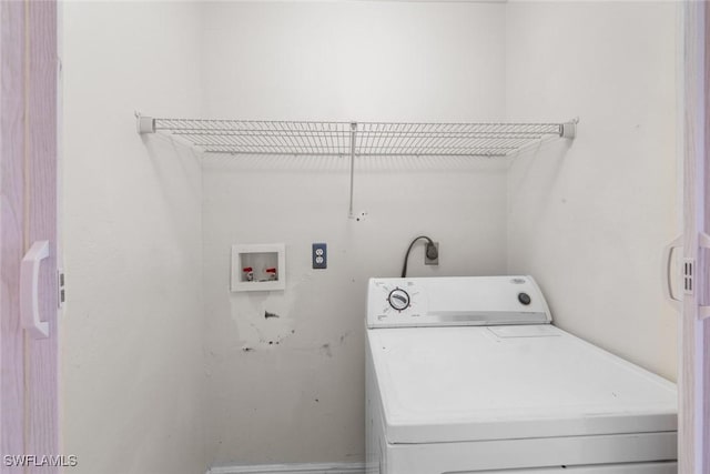 washroom featuring washer / clothes dryer