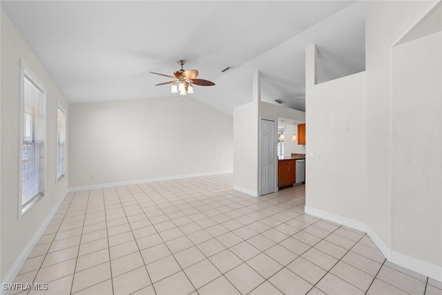unfurnished living room featuring vaulted ceiling, light tile patterned flooring, a ceiling fan, and visible vents