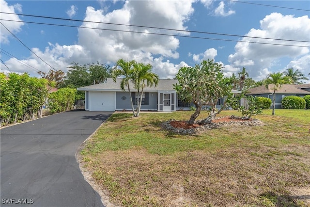 5295 17th Ave SW, Naples, FL 34116 - ranch-style home with an attached garage, stucco siding, a front yard, and aphalt driveway