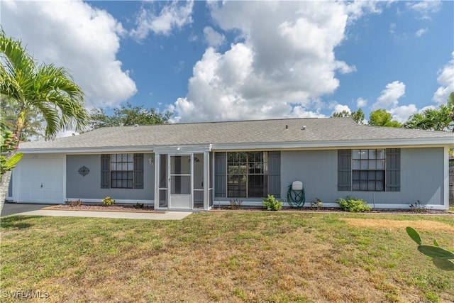 5295 17th Ave SW, Naples, FL 34116 - back of property featuring a yard, a sunroom, and an attached garage