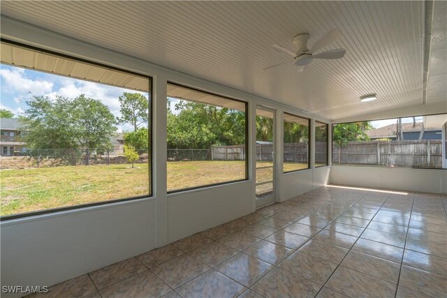 5295 17th Ave SW, Naples, FL 34116 - unfurnished sunroom featuring a ceiling fan