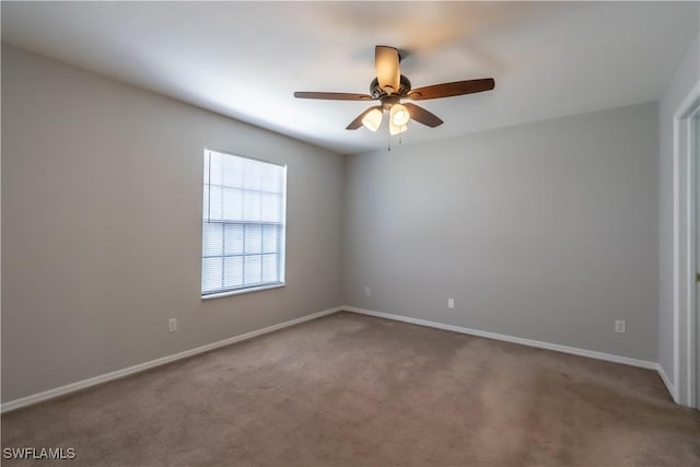 5295 17th Ave SW, Naples, FL 34116 - empty room featuring carpet, baseboards, and ceiling fan