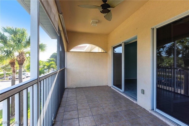 balcony featuring a ceiling fan