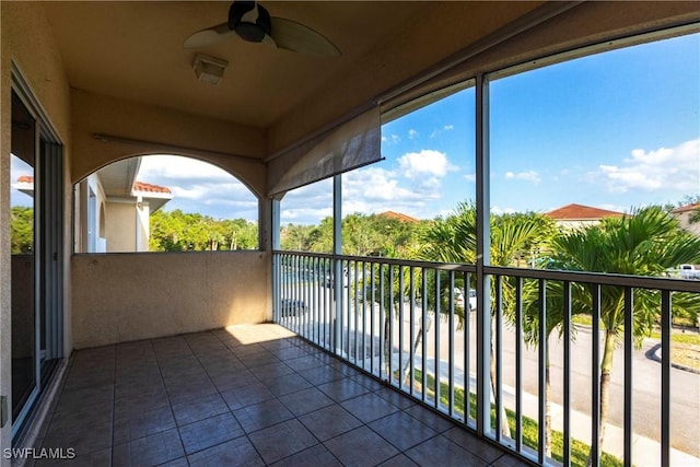 balcony featuring ceiling fan