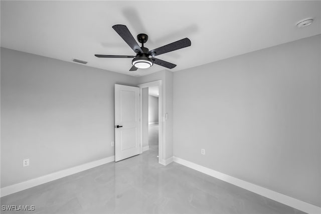unfurnished bedroom with visible vents, baseboards, and ceiling fan