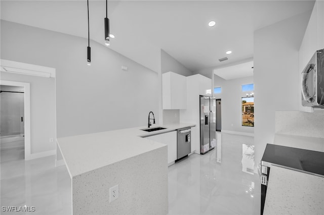 kitchen featuring a sink, recessed lighting, white cabinets, modern cabinets, and appliances with stainless steel finishes