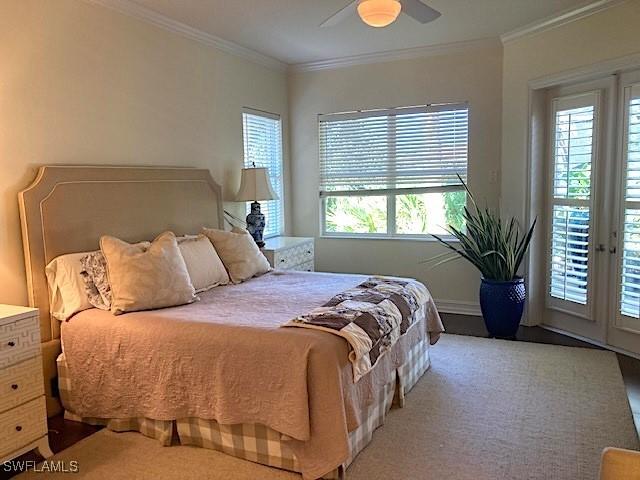 bedroom with crown molding, ceiling fan, and access to exterior