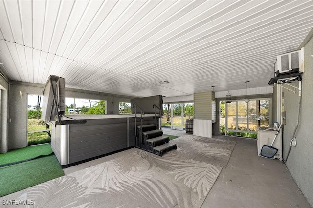 8625 Redwood Dr, Saint James City, FL 33956 - view of patio / terrace featuring a hot tub