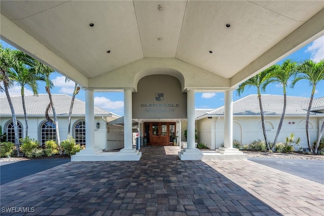 917 Fairhaven Ct Unit 29, Naples, FL 34104 - view of patio featuring french doors