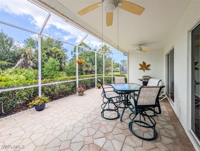917 Fairhaven Ct Unit 29, Naples, FL 34104 - sunroom with ceiling fan and outdoor dining area