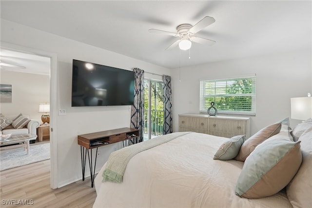 bedroom featuring light wood finished floors and a ceiling fan