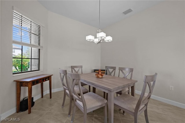 dining space with baseboards, an inviting chandelier, visible vents, and light tile patterned floors