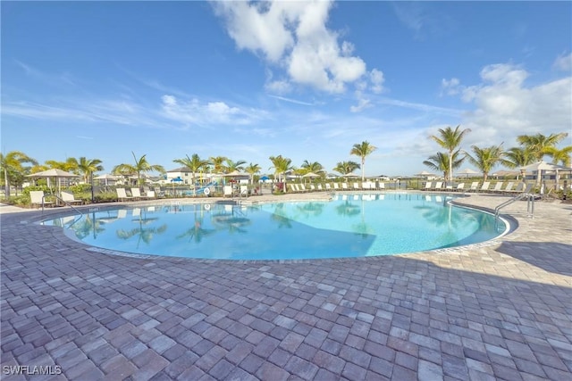 community pool with a patio