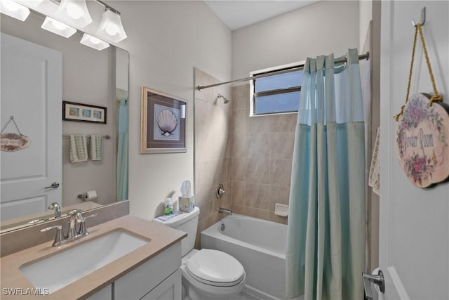 full bathroom with toilet, vanity, and shower / bathtub combination with curtain