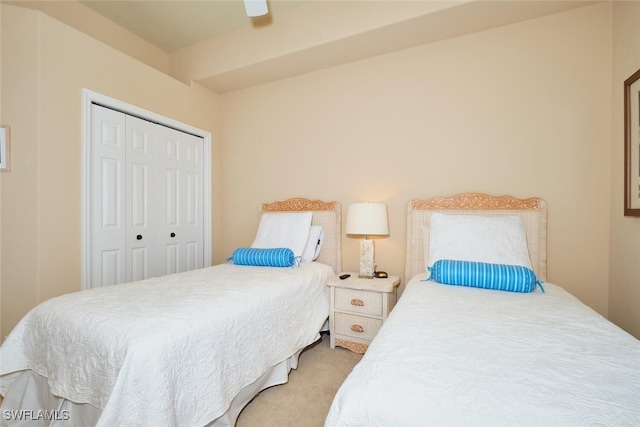 17110 Bridgestone Ct Unit 303, Fort Myers, FL 33908 - bedroom featuring a closet, light carpet, and a ceiling fan