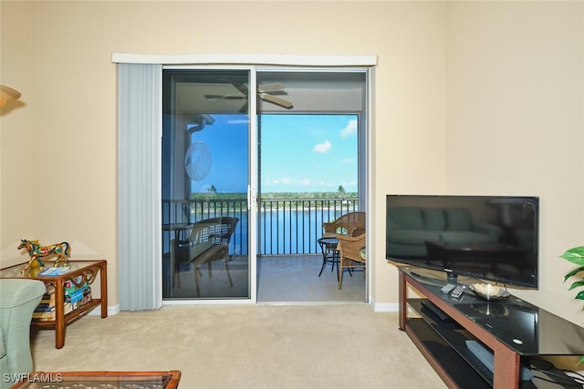 17110 Bridgestone Ct Unit 303, Fort Myers, FL 33908 - living room featuring baseboards and carpet