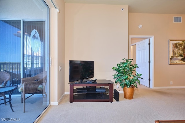 17110 Bridgestone Ct Unit 303, Fort Myers, FL 33908 - carpeted living room featuring baseboards and visible vents
