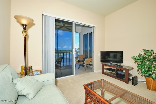 17110 Bridgestone Ct Unit 303, Fort Myers, FL 33908 - carpeted living area featuring baseboards