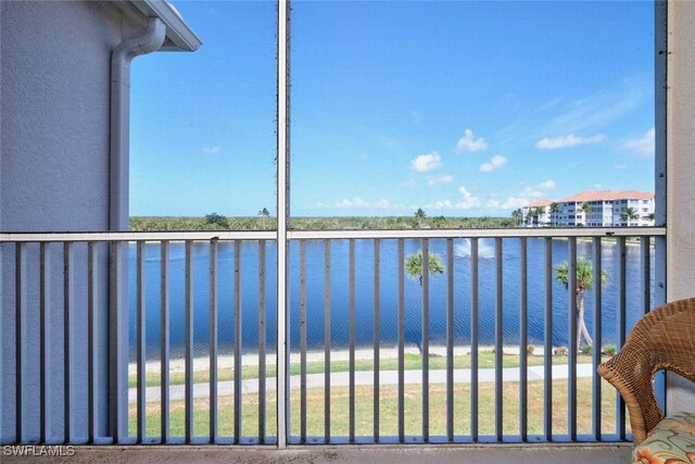 17110 Bridgestone Ct Unit 303, Fort Myers, FL 33908 - balcony featuring a water view