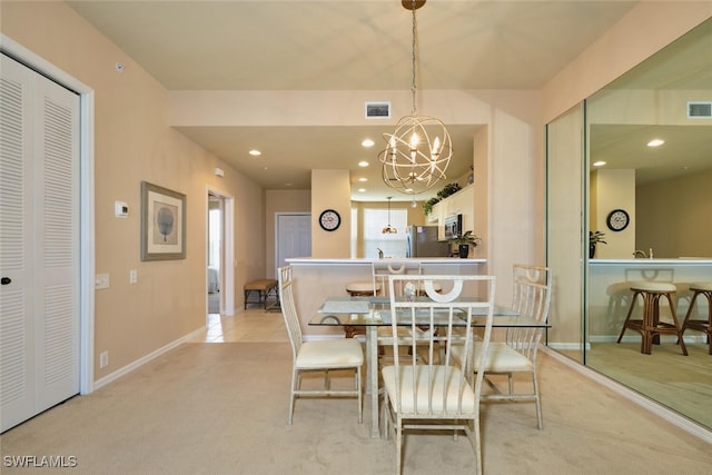 17110 Bridgestone Ct Unit 303, Fort Myers, FL 33908 - dining area with recessed lighting, baseboards, an inviting chandelier, visible vents, and light colored carpet