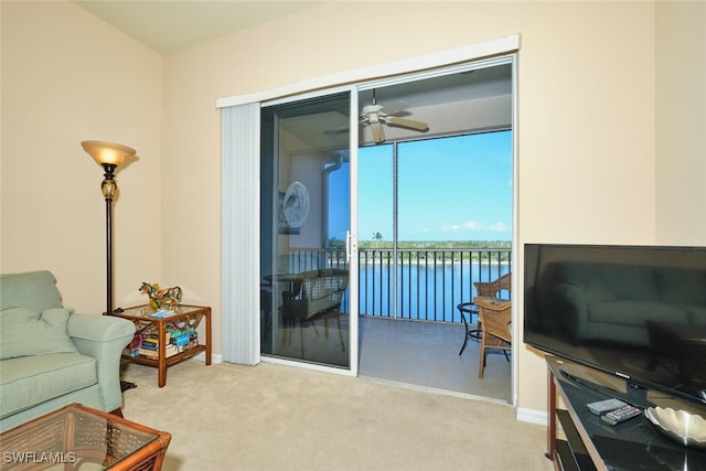 17110 Bridgestone Ct Unit 303, Fort Myers, FL 33908 - living area with carpet, baseboards, and ceiling fan