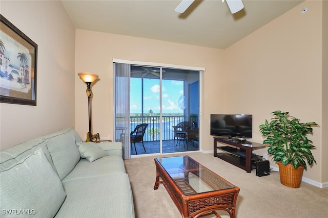 17110 Bridgestone Ct Unit 303, Fort Myers, FL 33908 - living room featuring carpet flooring, baseboards, and a ceiling fan