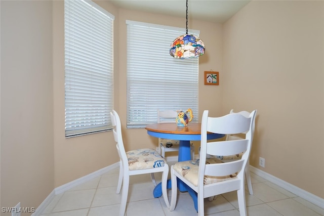 17110 Bridgestone Ct Unit 303, Fort Myers, FL 33908 - dining space featuring tile patterned flooring and baseboards