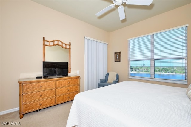 17110 Bridgestone Ct Unit 303, Fort Myers, FL 33908 - bedroom featuring light colored carpet, baseboards, and a ceiling fan