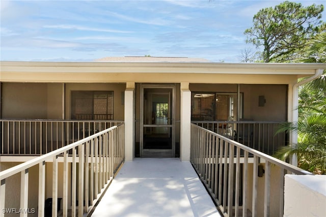 15400 Cedarwood Ln Unit 204, Naples, FL 34110 - property entrance featuring a porch