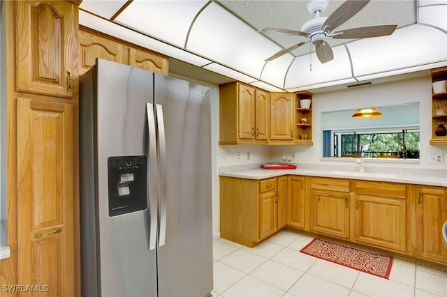 15400 Cedarwood Ln Unit 204, Naples, FL 34110 - kitchen with stainless steel refrigerator with ice dispenser, open shelves, ceiling fan, and light countertops