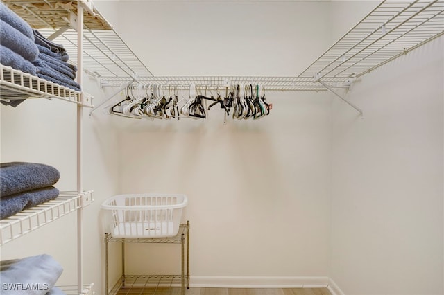 15400 Cedarwood Ln Unit 204, Naples, FL 34110 - spacious closet featuring wood finished floors