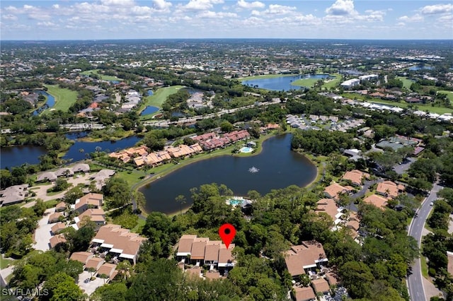 15400 Cedarwood Ln Unit 204, Naples, FL 34110 - aerial overview of property's location with nearby suburban area and a large body of water