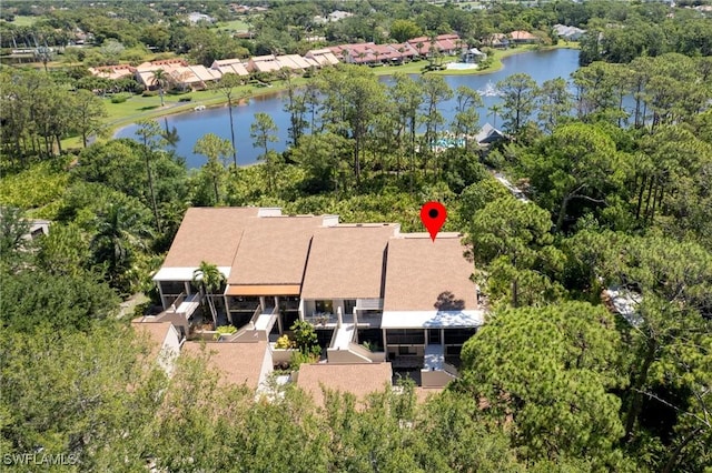 15400 Cedarwood Ln Unit 204, Naples, FL 34110 - aerial view of a large body of water and a tree filled landscape