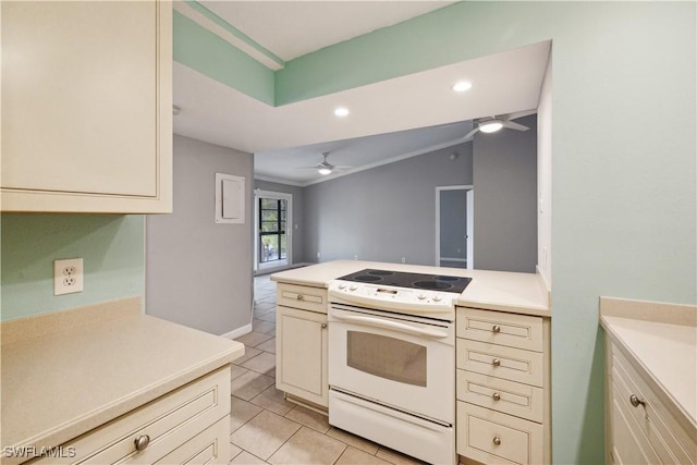 kitchen featuring a ceiling fan, recessed lighting, cream cabinetry, light countertops, and electric range