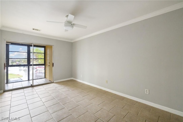 unfurnished room featuring a ceiling fan, tile patterned floors, crown molding, visible vents, and baseboards