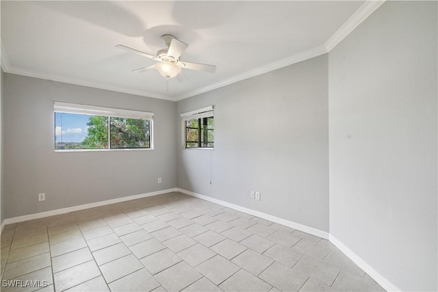 unfurnished room featuring ceiling fan, ornamental molding, baseboards, and light tile patterned floors