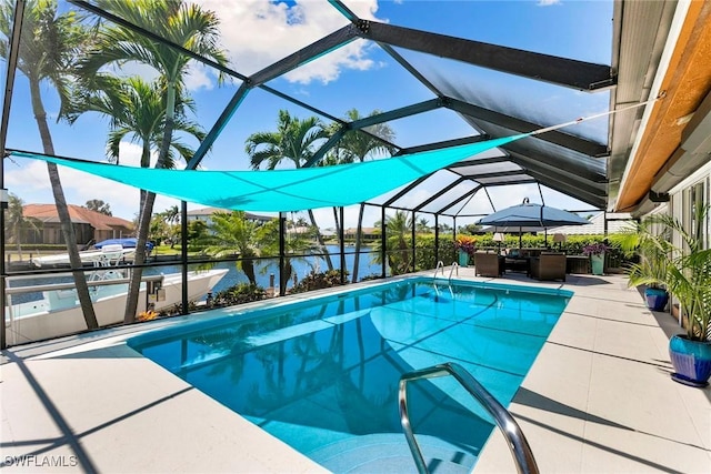 outdoor pool featuring a water view, a patio, an outdoor living space, and glass enclosure