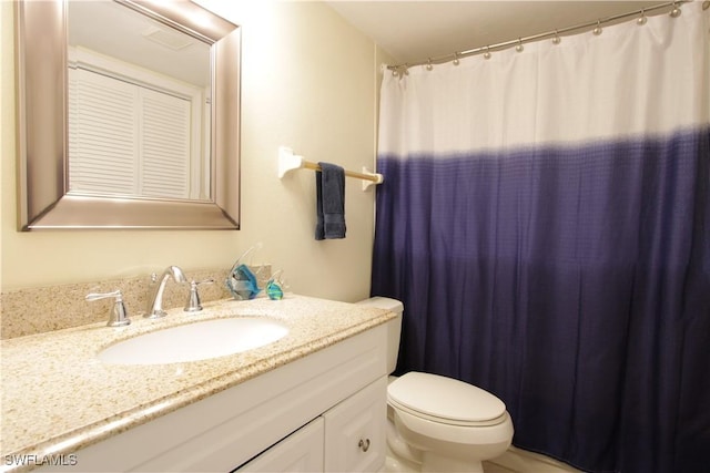 full bathroom with vanity, toilet, and a shower with shower curtain
