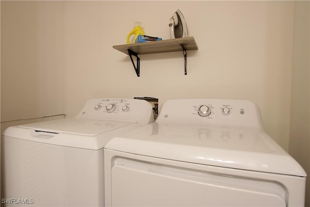 laundry area featuring separate washer and dryer