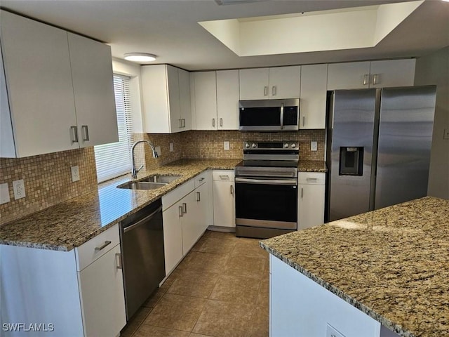 417 NW 18th Pl, Cape Coral, FL 33993 - kitchen with a sink, backsplash, stone countertops, and appliances with stainless steel finishes