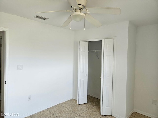 417 NW 18th Pl, Cape Coral, FL 33993 - unfurnished bedroom featuring a closet, visible vents, baseboards, and a ceiling fan