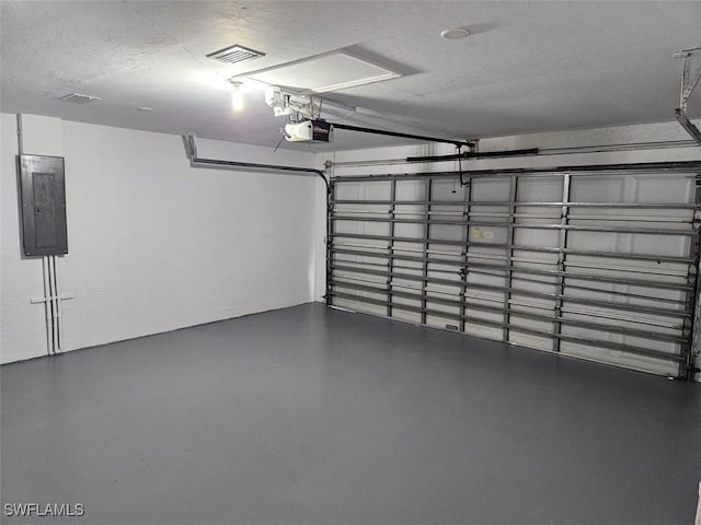 417 NW 18th Pl, Cape Coral, FL 33993 - garage with electric panel and a garage door opener
