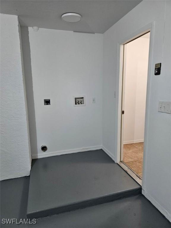 417 NW 18th Pl, Cape Coral, FL 33993 - laundry area with laundry area, electric dryer hookup, baseboards, and hookup for a washing machine