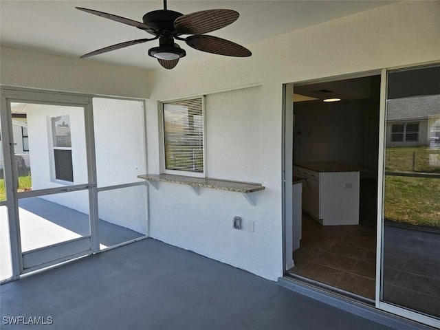 417 NW 18th Pl, Cape Coral, FL 33993 - unfurnished sunroom featuring ceiling fan