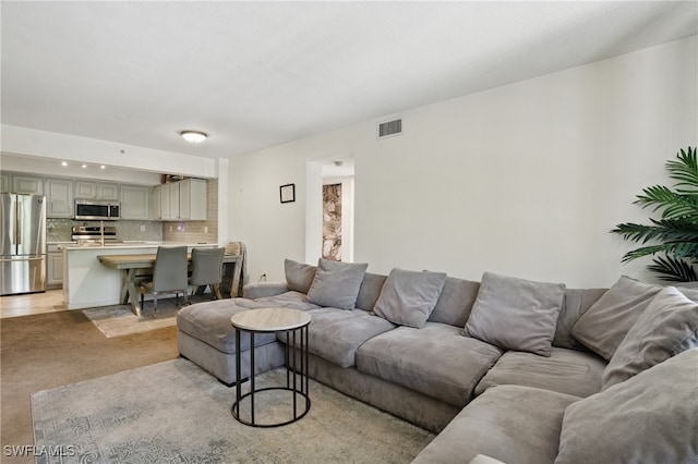 4109 Residence Dr Unit 515, Fort Myers, FL 33901 - living room with light colored carpet